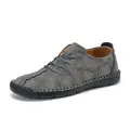 Premium grey men's casual leather lace-up shoe with intricate hand-stitched detailing - Gray