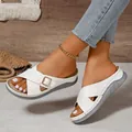 Elegant white wedge sandals with cross straps and metallic buckle detail for summer - 36 / White