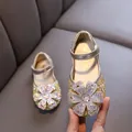 Elegant gold rhinestone Mary Jane shoes for girls featuring a large sparkling flower. - 21 / Gold