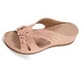 Detail view of pink wedge sandals for women with floral accents and perforations. - 36 / Tan