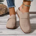 Detail of beige closed-toe mules with decorative laser-cut honeycomb and floral patterns - 36 / Off White