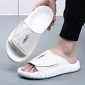 Premium men's white leather slides featuring a thick EVA sole and adjustable strap - 38 / White