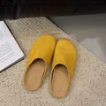 Casual mustard yellow suede closed-toe mules for women, stylish slip-on flat slippers - 35 / Yellow