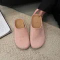 Elegant pink suede closed-toe mules for women featuring a comfortable thick sole design - 35 / Pink