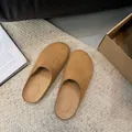 Elegant tan suede slip-on mules for women with cozy indoor lifestyle aesthetic - Khaki