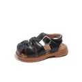 Classic black closed-toe sandals for toddler girls featuring a soft brown comfort sole - Black