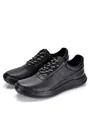 Close-up of premium black leather sneakers featuring perforated breathability and soft soles - 38 / Black
