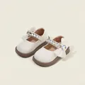 Zapatos Mary Jane blancos para bebé niña con tiras de diamantes y detalle de lazo - 13cm / Beige