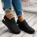 Women's black knit wedge sneakers with mesh upper and round toe design for casual wear. - 37 / Black
