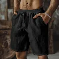 Vista dettagliata dei pantaloncini da uomo in cotone e lino neri con vita regolabile - Nero