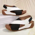 Detail of black and white color-block wedge sandals with velcro strap and platform sole. - 36 / Black and White