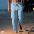 Close-up detail of breathable light blue men's linen beach pants with drawstring waist - Light Blue