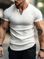 Close-up showing the textured ribbed fabric and athletic fit of this white men's Henley shirt - S / Tops / White