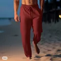 Close-up detail of red men's breathable linen beach trousers with drawstring elastic waist - Burgundy