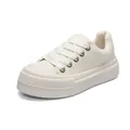 Cream white platform chunky sneakers with thick sole and white laces for a trendy casual look. - 38 / White