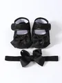 Close-up of elegant black baby princess shoes with a matching large bow headband - Size 11 (Inner Length 10.5CM) / Bow Shoes Headband Set / Black