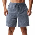 Detailed view of men's tie-dye French Terry shorts with elastic drawstring waist - S / Bottoms / Light Gray
