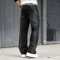 Jeans streetwear neri da uomo con vestibilità dritta e rilassata e decorazioni in strass - L/32 / Pantaloni e gonne / Nero