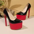 Close-up view of 18cm stiletto high heels with thick red platform and black patent upper - 35 / Black Red