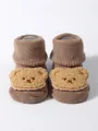 Detail showing the thick knitted texture and plush bear patch on brown baby floor socks - S (0-1 Year) / Khaki (Khaki Bear Decoration)