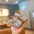 Elegante zilveren babysandalen voor meisjes met strik en pailletten, zachte zool. - Zilver