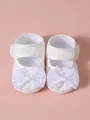 Détail de chaussures bébé en dentelle blanche avec nœuds et semelle souple. - Taille 11 (10.5CM) / Nœud en Dentelle Blanc