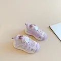 Macro view of lavender children's closed-toe sandals featuring white mesh and rotary button - Size 32 (Length 20.3cm) / Purple