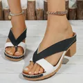 Detail view of black and white color-block chunky heel thong sandals for women. - Black and White