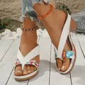 Close-up of white chunky heel flip-flop sandals with colorful butterfly prints - White Floral