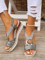 Detail shot of women's wedge sandals featuring double ring buckle and elastic straps. - 36 / Dark Gray