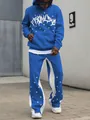 Détail de l'ensemble sweat à capuche bleu pour homme avec imprimés étoiles blanches - S / Haut Et Bas / Bleu saphir