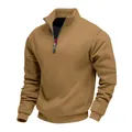 Macro view of men's casual quarter-zip sweatshirt featuring a stand collar and ribbed hem - Camel