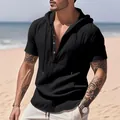 Close-up of black casual men's hooded Henley shirt featuring stylish buttons and hood - S / Tops / Black
