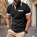Stylish men's black polo shirt featuring white contrast trim and chest pocket detail - S / Tops / Black