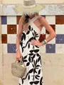 Stylish women's summer sleeveless halter dress with black leaf print and beige patchwork - XS / Dresses / White With Black Flowers