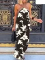 Elegant black floral halter neck maxi dress with a loose summer fit - XS / Dresses / Black With White Flowers