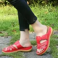 Stylish red wedge sandals for women featuring cutout cross straps and non-slip sole - 35 / Red