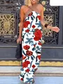 Elegant sleeveless halter neck maxi dress with bold red and blue floral print on white background - XS / Dresses / White with Red Floral