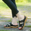 Women's black wedge sandals with hollow-out cross straps and thick non-slip soles. - 35 / Black