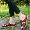 Elegant burgundy wedge sandals featuring hollowed cross straps and comfortable thick soles - 35 / Burgundy