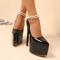 Detailed macro view of 18cm black patent leather platform pumps with elegant pearl ankle straps - 35 / Double Pearl Chain Style (11001111) / Black