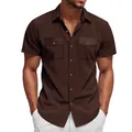 Detailed view of brown corduroy short-sleeve shirt featuring dual utility pockets - S / Tops / Brown