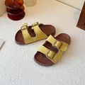 Yellow suede double buckle Birkenstock style sandals displayed on a white textured table - Size 26 (Inner Length 16cm) / Yellow