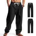 Men's loose black linen casual pants with drawstring and wide leg design for summer - Black