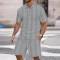 Detailed view of men's grey jacquard textured short sleeve polo and shorts set - S / Top And Bottom / Gray