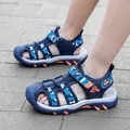 Boys outdoor closed-toe sandals in dark blue featuring camo patterns and orange accents - 28 / Dark Blue