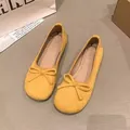 Eleganti scarpe basse scamosciate giallo senape con un fiocco decorativo per donna - 35 / Giallo