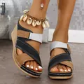Detailed view of women's color-block platform wedge sandals with adjustable velcro straps - 36 / Black Brown