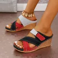 Close-up of color-block wedge sandals with Velcro straps and wood grain platform - 36 / Black Red
