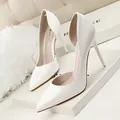Elegant white patent leather d'Orsay high heel pumps with pointed toe design. - 34 / Pumps (638-5) / White